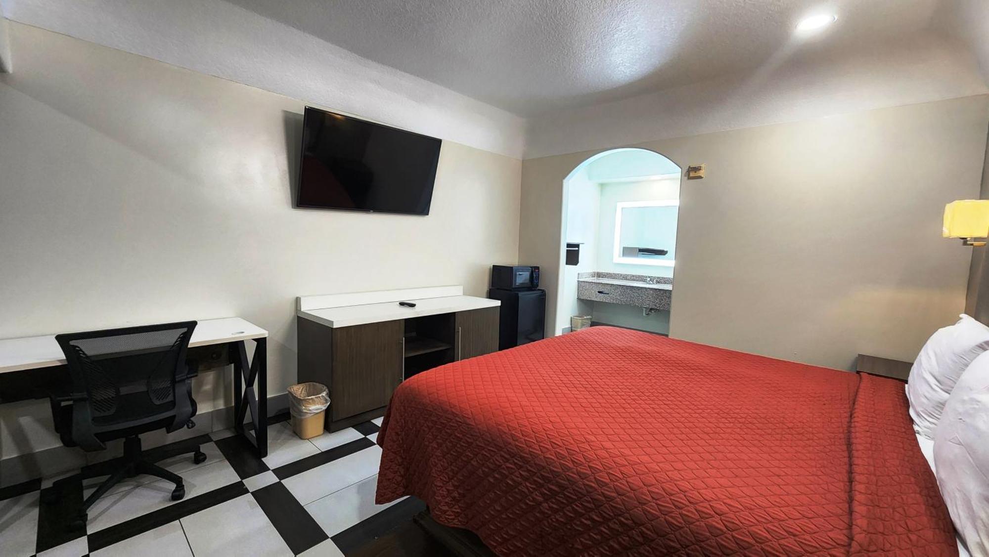 Scottish Inn & Suites Sam Houston Parkway Екстериор снимка